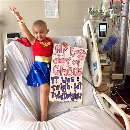 Celebrating a final chemotherapy treatment, a 3-year-old Texas girl in a Wonder Woman costume is getting love from tens of thousands of strangers on the Internet — including “Wonder Woman” herself.