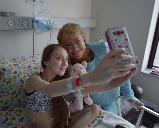 Chile leader visits ailing 14 year-old who wants to end her life