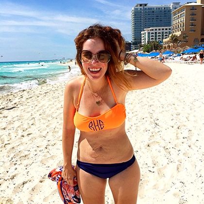 Rachel Hollis may have just become the world's most famous – and inspirational – swimsuit model. The mother of three posted a bikini beach photo